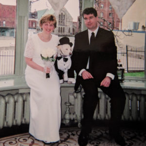 Christine and Kevin with their best man, Monty. The happy couple rescued Monty (now deceased) from Nunavut in 1995.